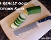 kitchen knife and sliced zucchini