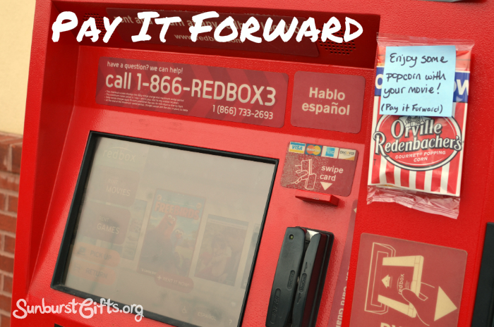 pay it forward popcorn taped to Redbox machine