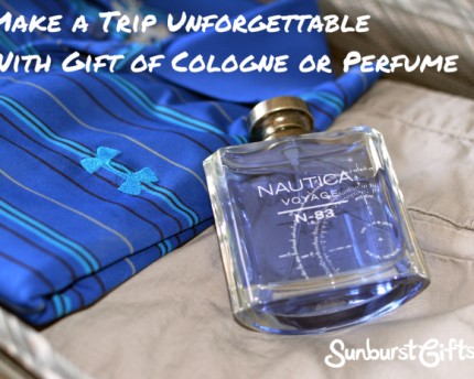 bottle of cologne in luggage on top of clothes
