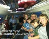 large family riding inside limousine