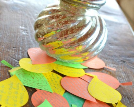 jar and notes written on leaf-shaped paper